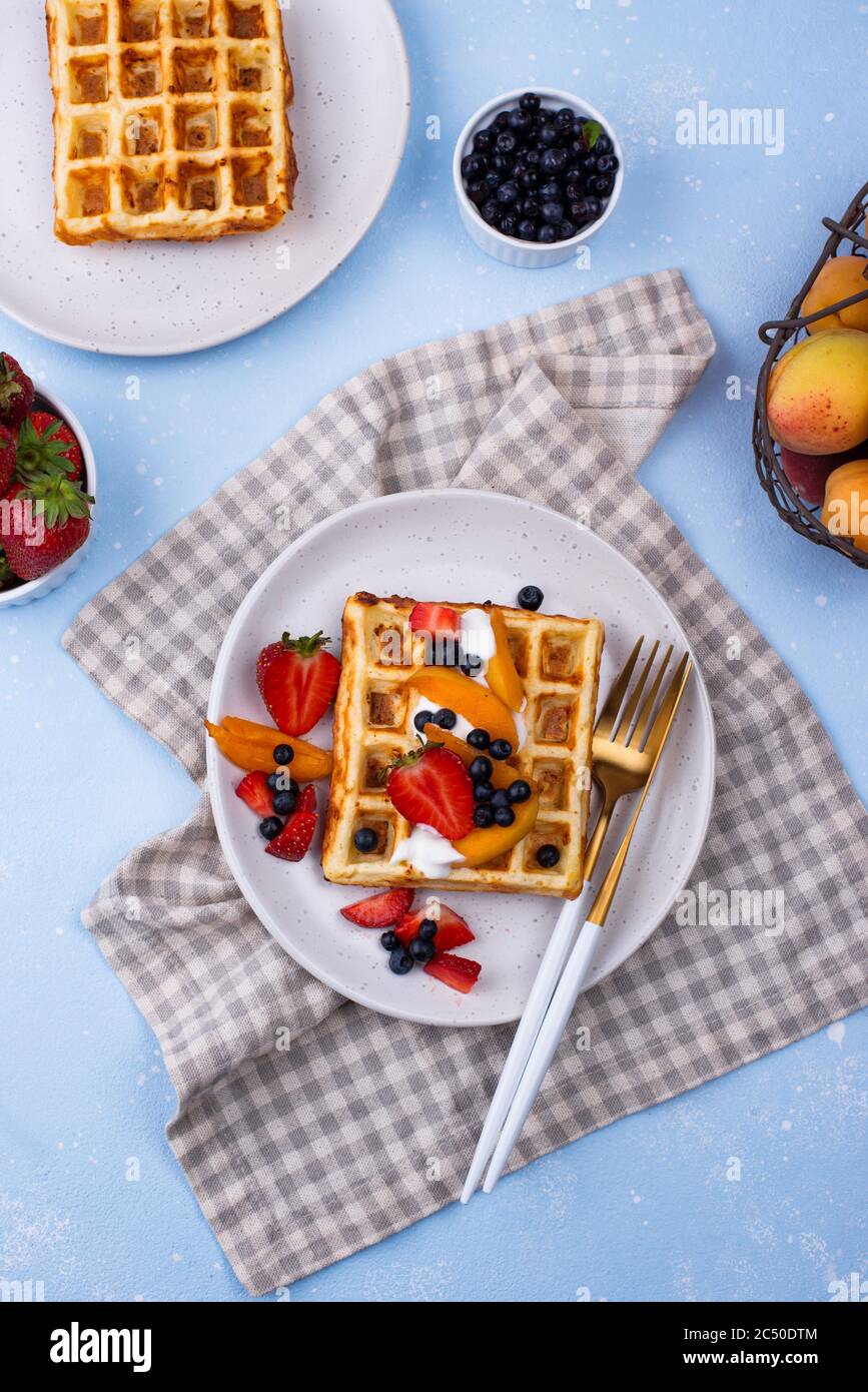 Waffles with berries and fruit Stock Photo Alamy