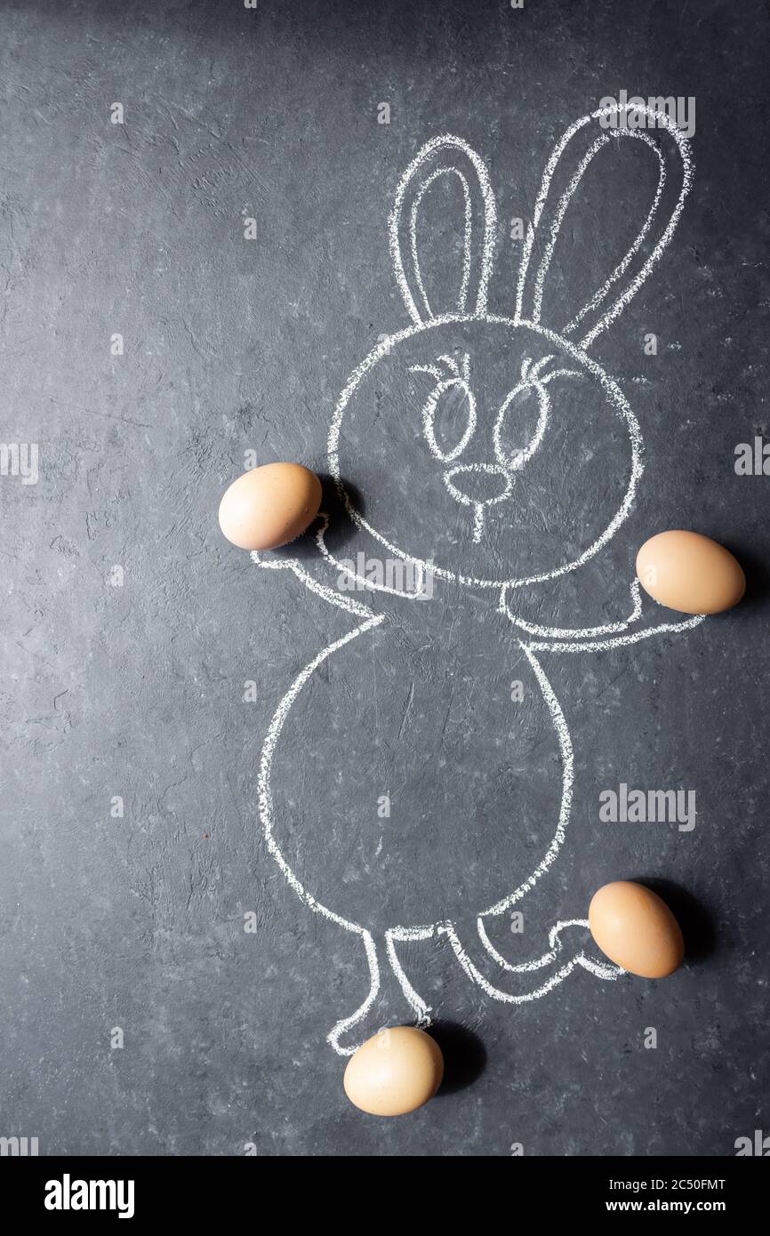 Easter bunny with eggs. Green grass and eggs. Chalk drawn bunny with real  grass and eggs Stock Photo - Alamy