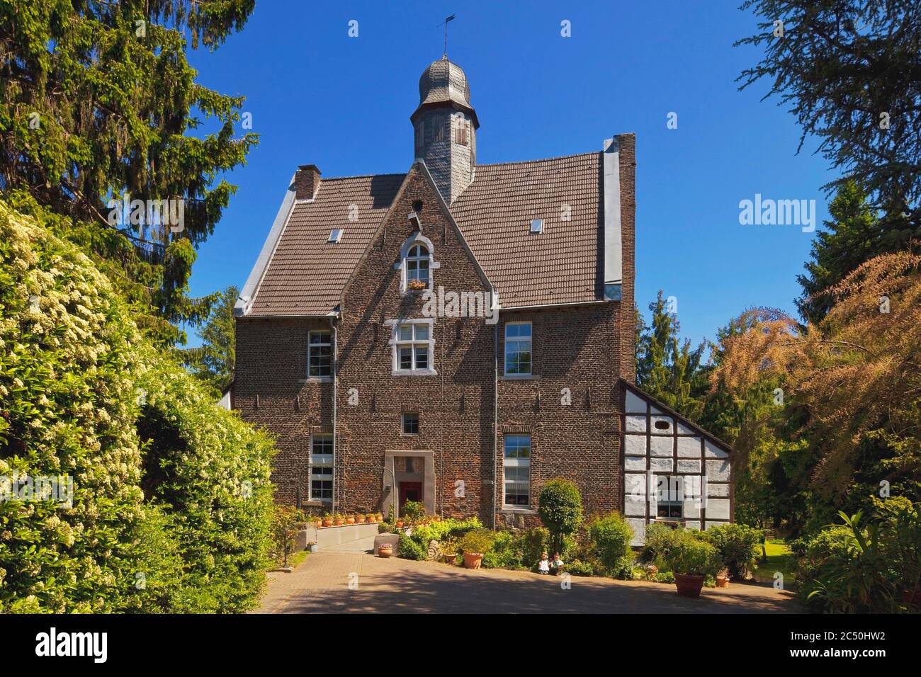 Quadenhof, medieval mundane brick-lined building in Gerresheim, Germany, North Rhine-Westphalia, Lower Rhine, Dusseldorf Stock Photo