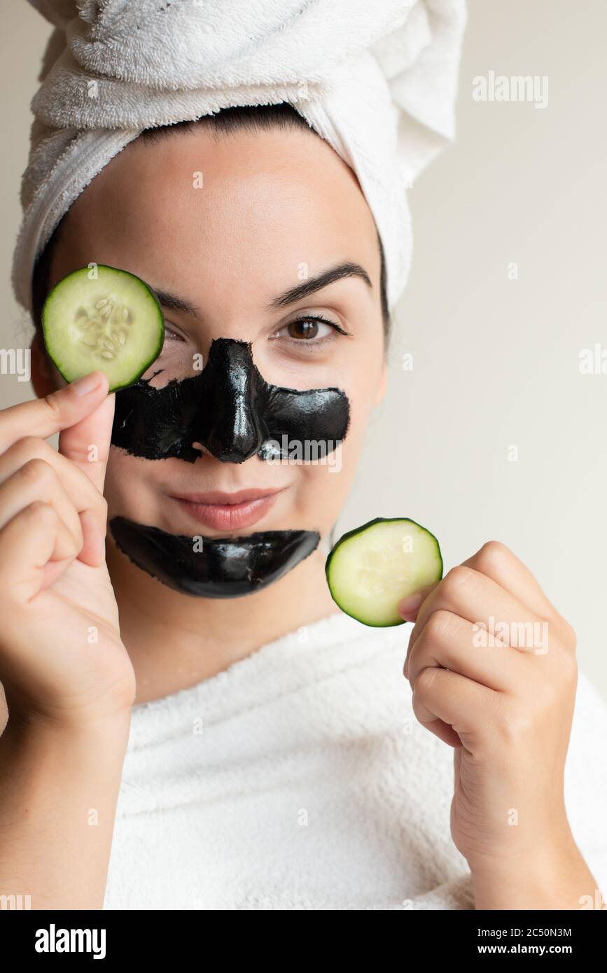 Woman peeling off mask hi-res stock photography and images - Alamy