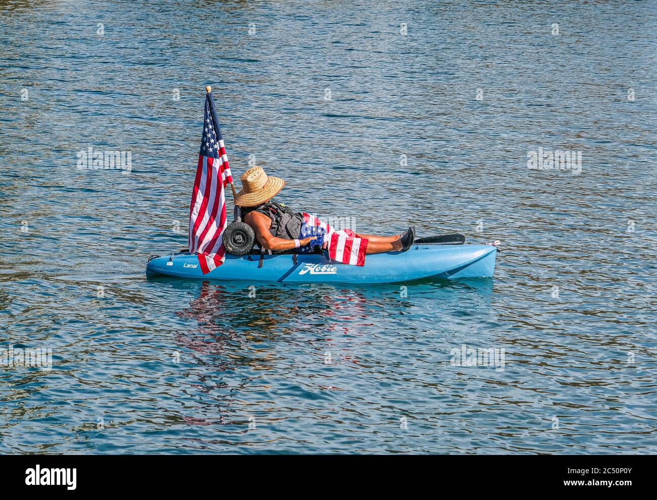 Man in Kayak with American Flags Stock Photo Alamy