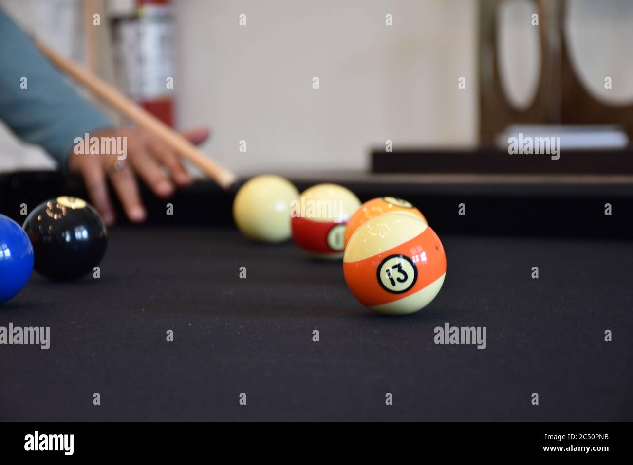 Friends Cheering While Their Friend Aiming For Billiards Ball Stock Photo,  Picture and Royalty Free Image. Image 28035174.