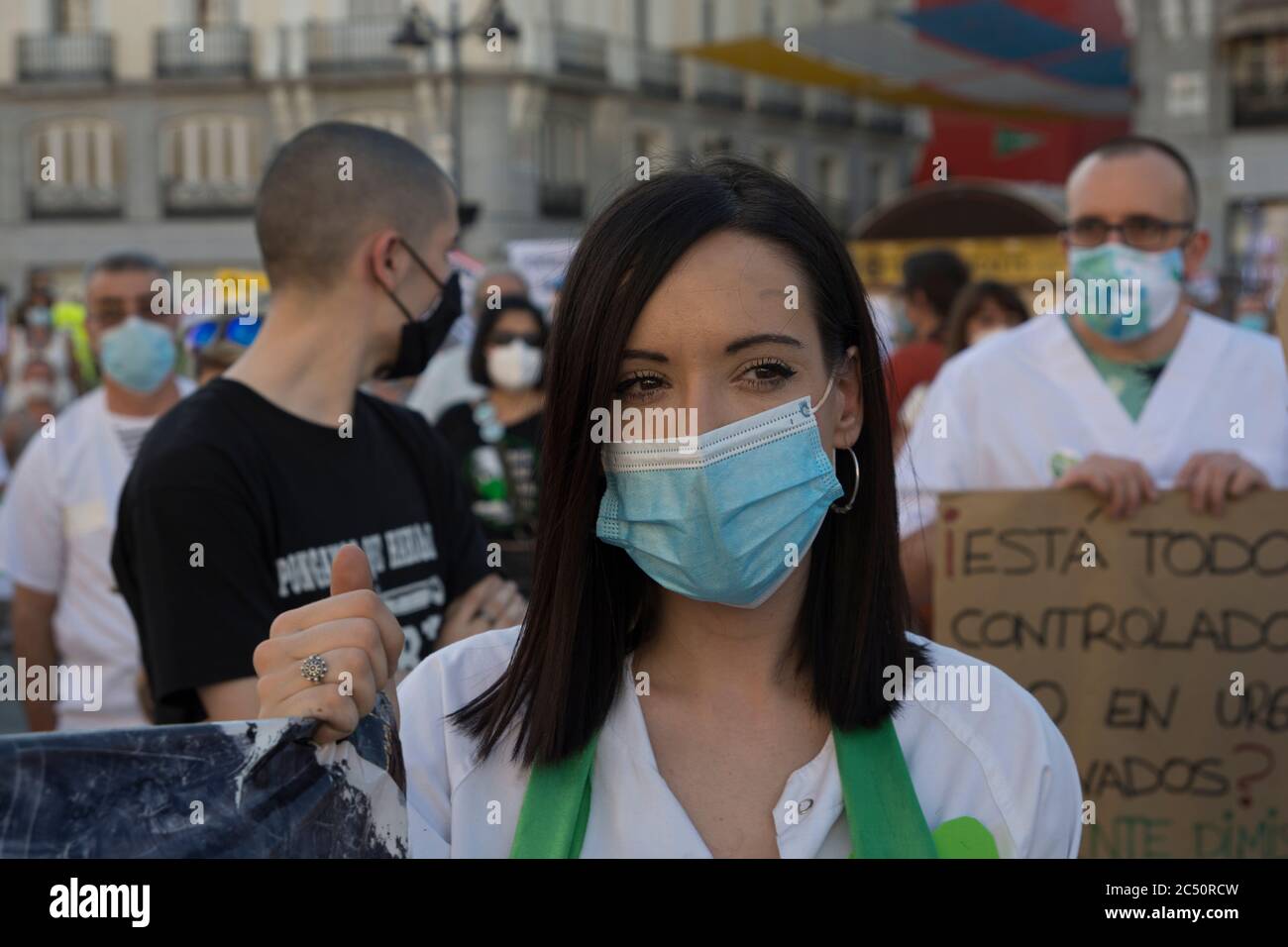 Hundreds of people have gathered at a gathering in Puerta del Sol in Madrid, Spain for protests against the privatization of public health in which he Stock Photo