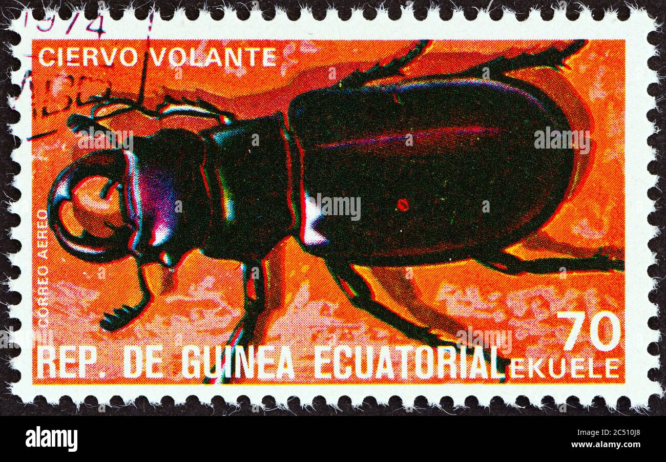 EQUATORIAL GUINEA - CIRCA 1978: A stamp printed in Equatorial Guinea from the 'Insects' issue shows Lucanus cervus, circa 1978. Stock Photo