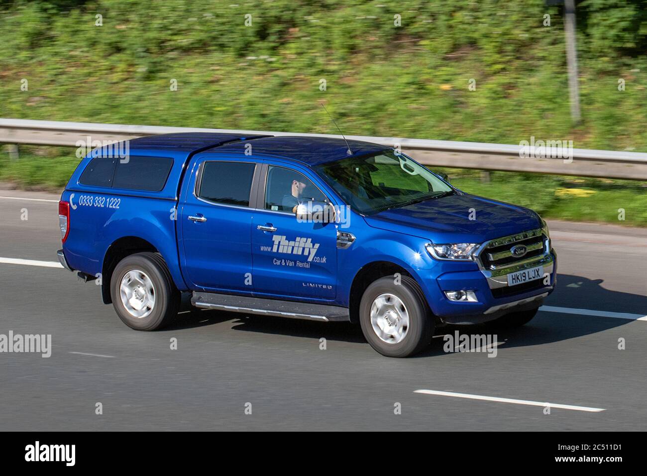 2019 blue Ford Ranger 3.2 TDCi Limited 1 Double Cab Pickup Auto 4WD 4dr;  Vehicular traffic moving vehicles, cars driving vehicle on UK roads,  motors, motoring on the M6 motorway highway network