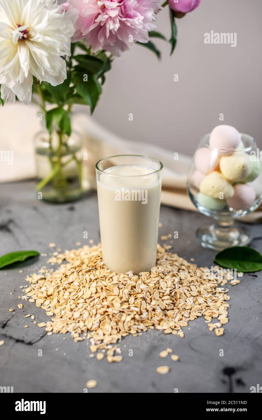 Vegetable natural oat milk on the table. A healthy alternative