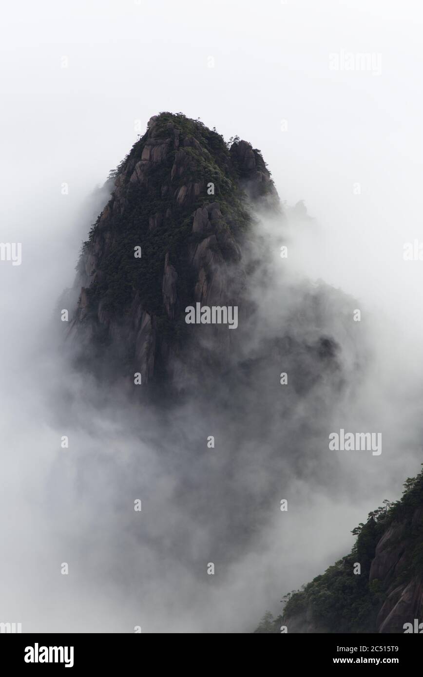 Huangshan or Yellow Mountains engulfed in clouds, Anhui Province, China Stock Photo