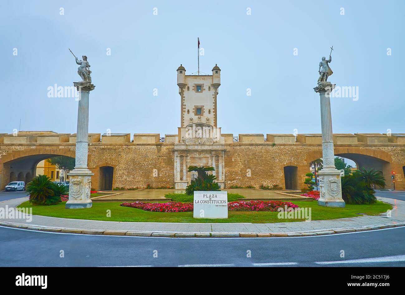 The Plaza de la Constitucion (Constitution Square) with Earthen Gate (Earth Doors, Puertas de Tierra), tower, rampart, white pillars with statues and Stock Photo