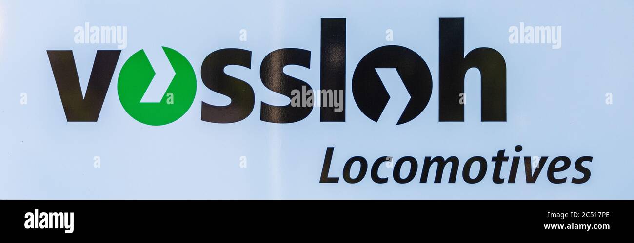 Firmenschild der Vossloh AG Hersteller von Schienfahrzeugen und Lokomotiven Stock Photo