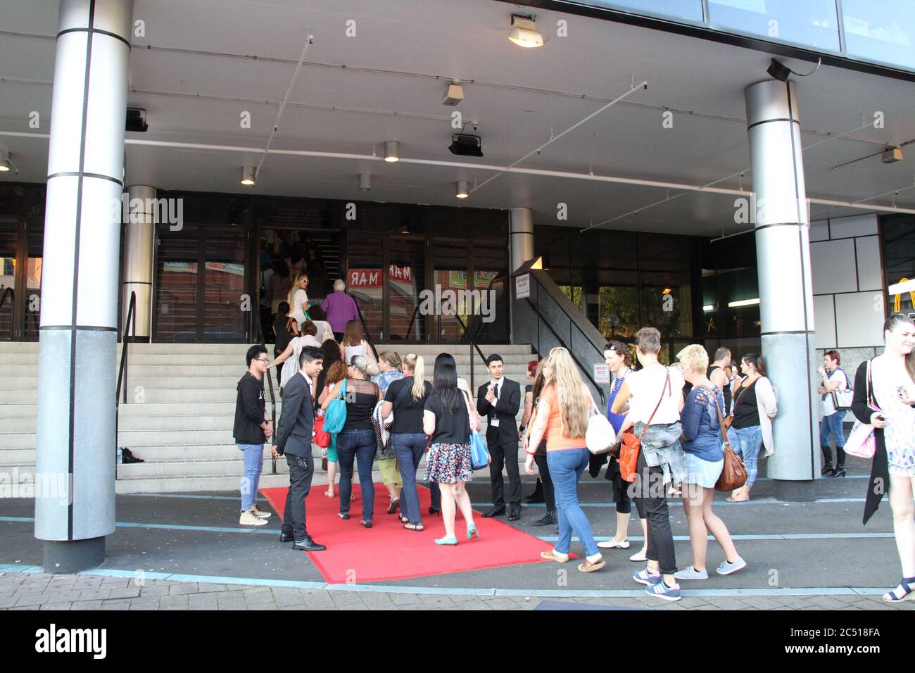 People outside the entrance to the Qantas Credit Union Arena on the