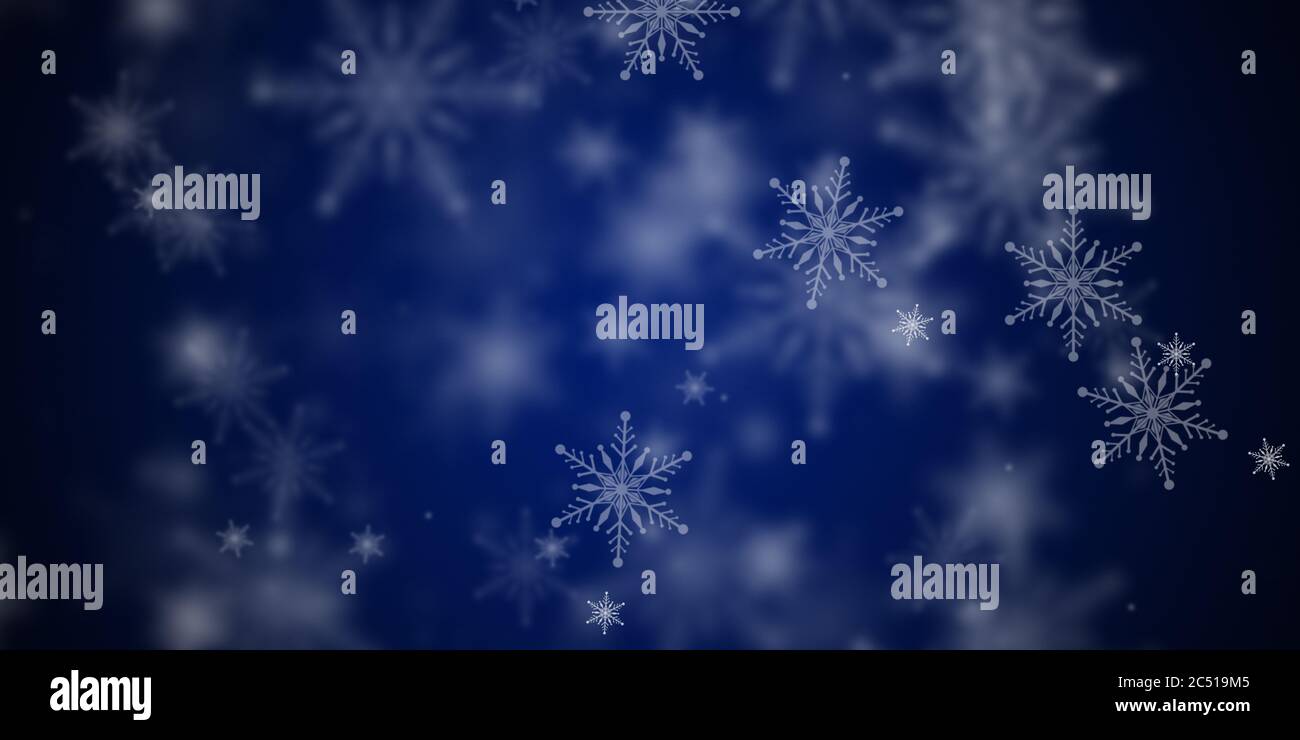 Snowflakes falling over blue hi-res stock photography and images - Alamy