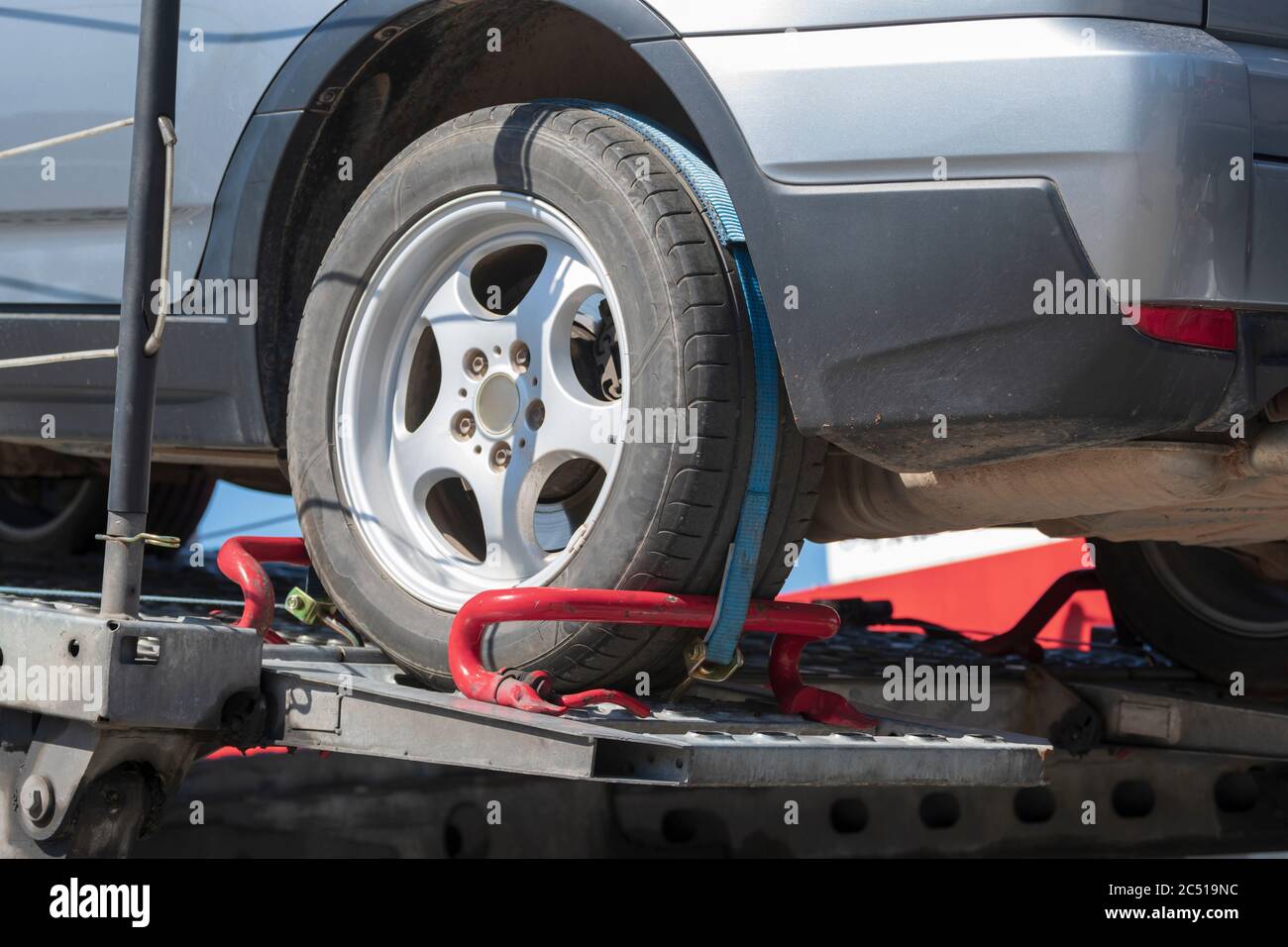 Securing the load of a car transporter Stock Photo