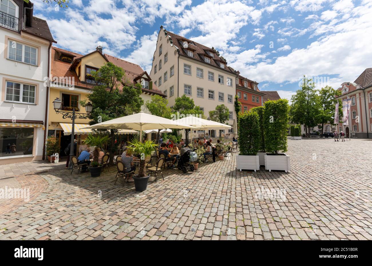 Meersburg, BW / Germany - 22 June 2020: tourists enjoying a day in Meersburg on Lake Constance in the restaurants at the Schlossplatz Square Stock Photo