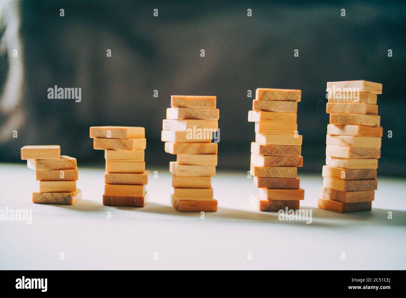 Wooden Cubes stack each other on Wood. Finance Business Design Template ...