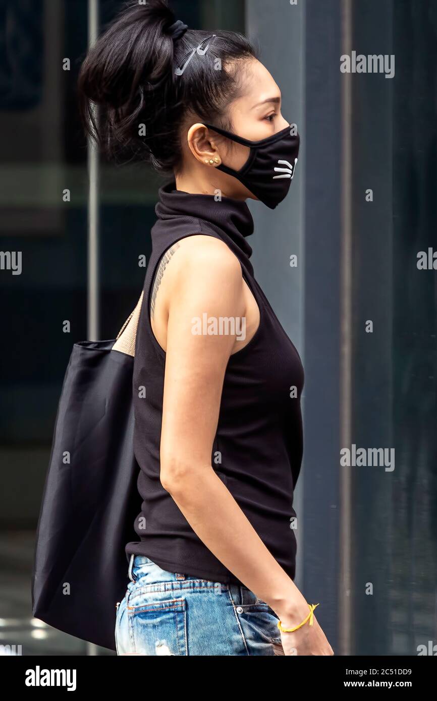 Girl wearing face mask during covid 19 pandemic, Bangkok, Thailand