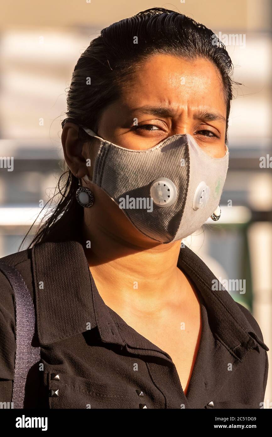Girl wearing face mask during covid 19 pandemic, Bangkok, Thailand Stock Photo