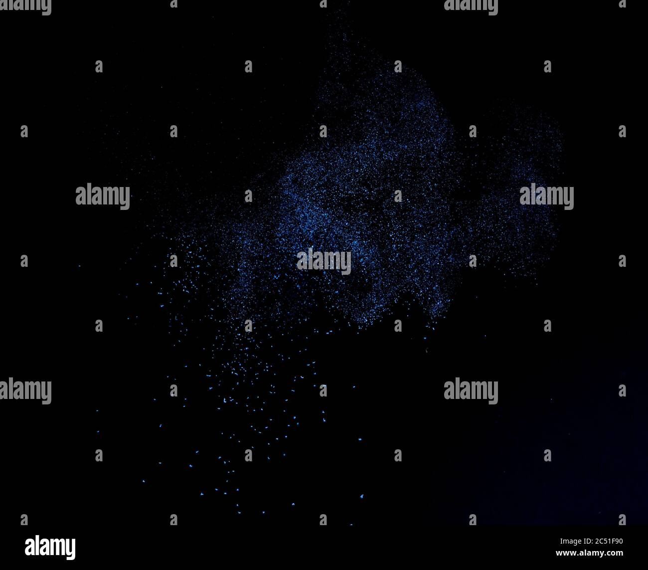 Blue dust on black background Stock Photo Alamy