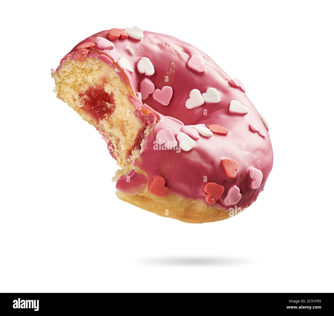 https://c8.alamy.com/comp/2C51F95/bitten-strawberry-donut-with-colorful-sprinkles-in-heart-shape-isolated-on-white-background-top-view-2C51F95.jpg