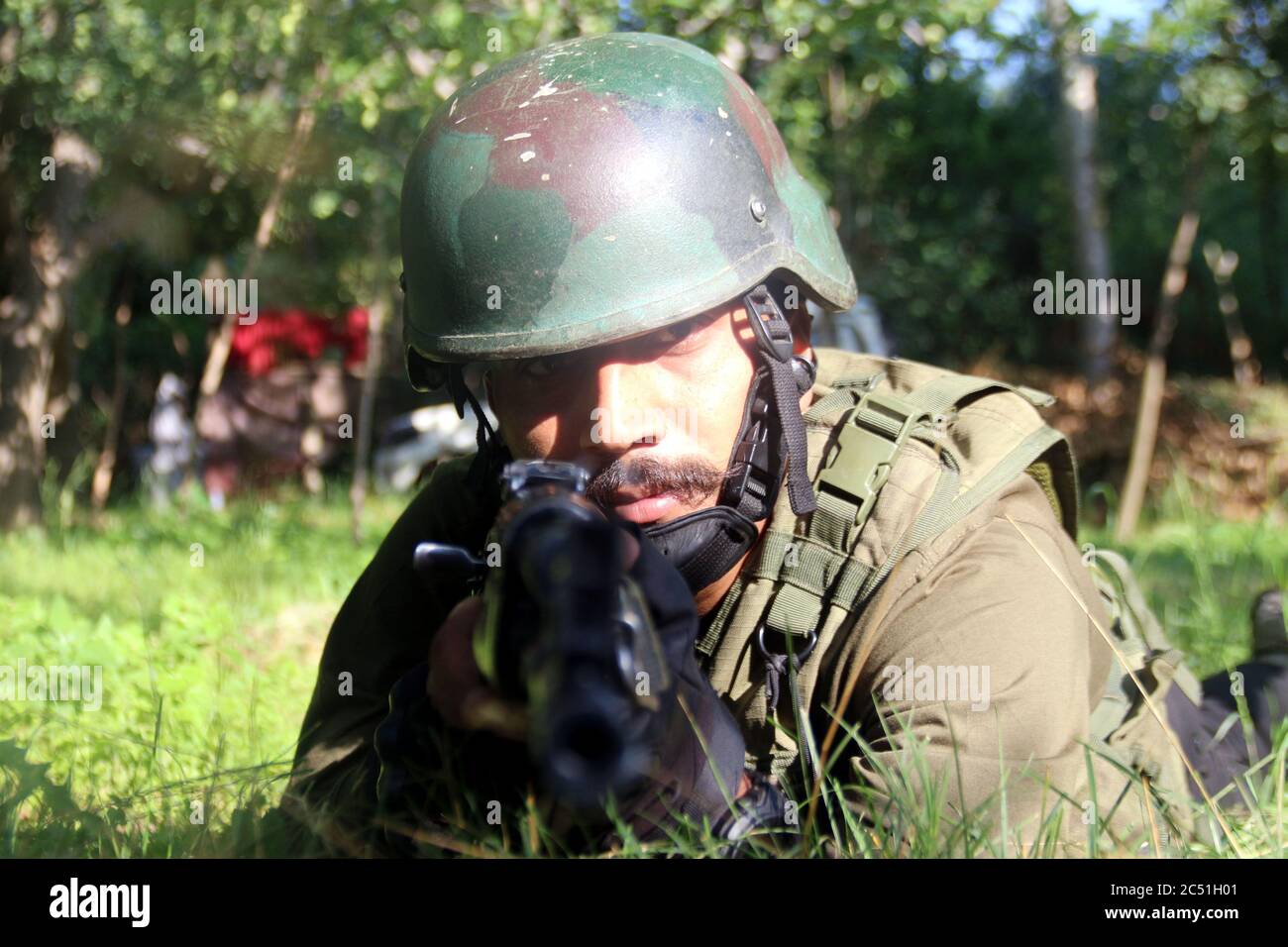 Two Jaish-e-Mohammed militants were killed in an encounter in Waghama area of Bijbehara in South Kashmir's Anantnag district. Identified as Yawar Ahmed Bhat and Arshid Ahmed Sheikh, the gunfight broke out after a joint team of Police and Army's 03 RR launched a cordon-and-search-operation in Waghama. As the joint team encircled the suspected spot, the hiding militants fired upon them. The fire was retaliated by the joint team, triggering off an encounter. Pertinently, 118 militants have been killed this year so far in Kashmir Valley. (Photo by Aasif Shafi/Pacific Press) Stock Photo