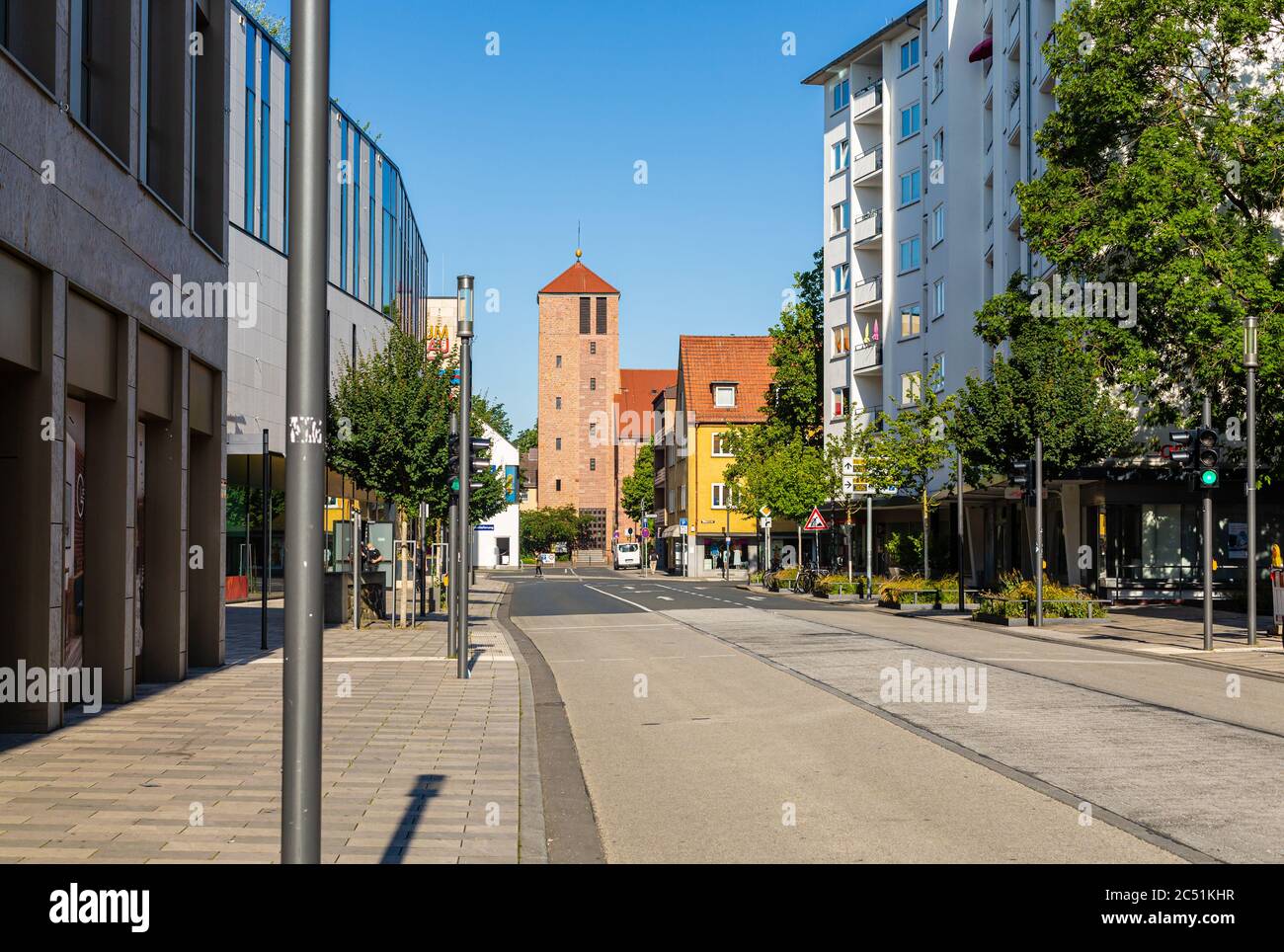Street in Hanau, Germany. Church tower. New construction in the city. German city. Summer in city. Stock Photo
