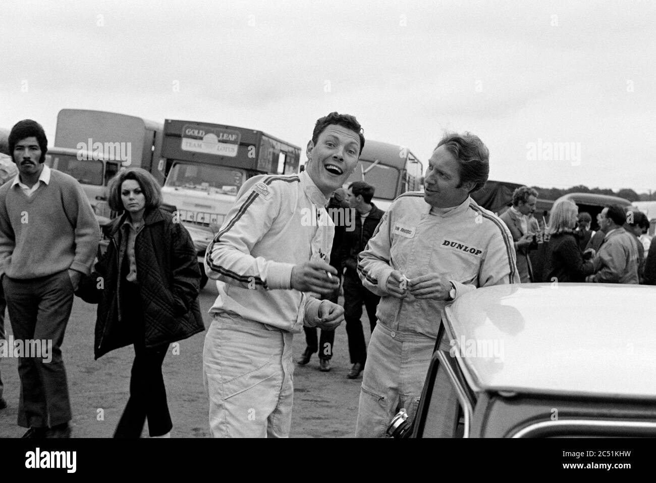The late Barrie Williams in conversation with fellow mini racer John Rhodes at Brands Hatch in 1969. Guards International Trophy Meeting. Stock Photo