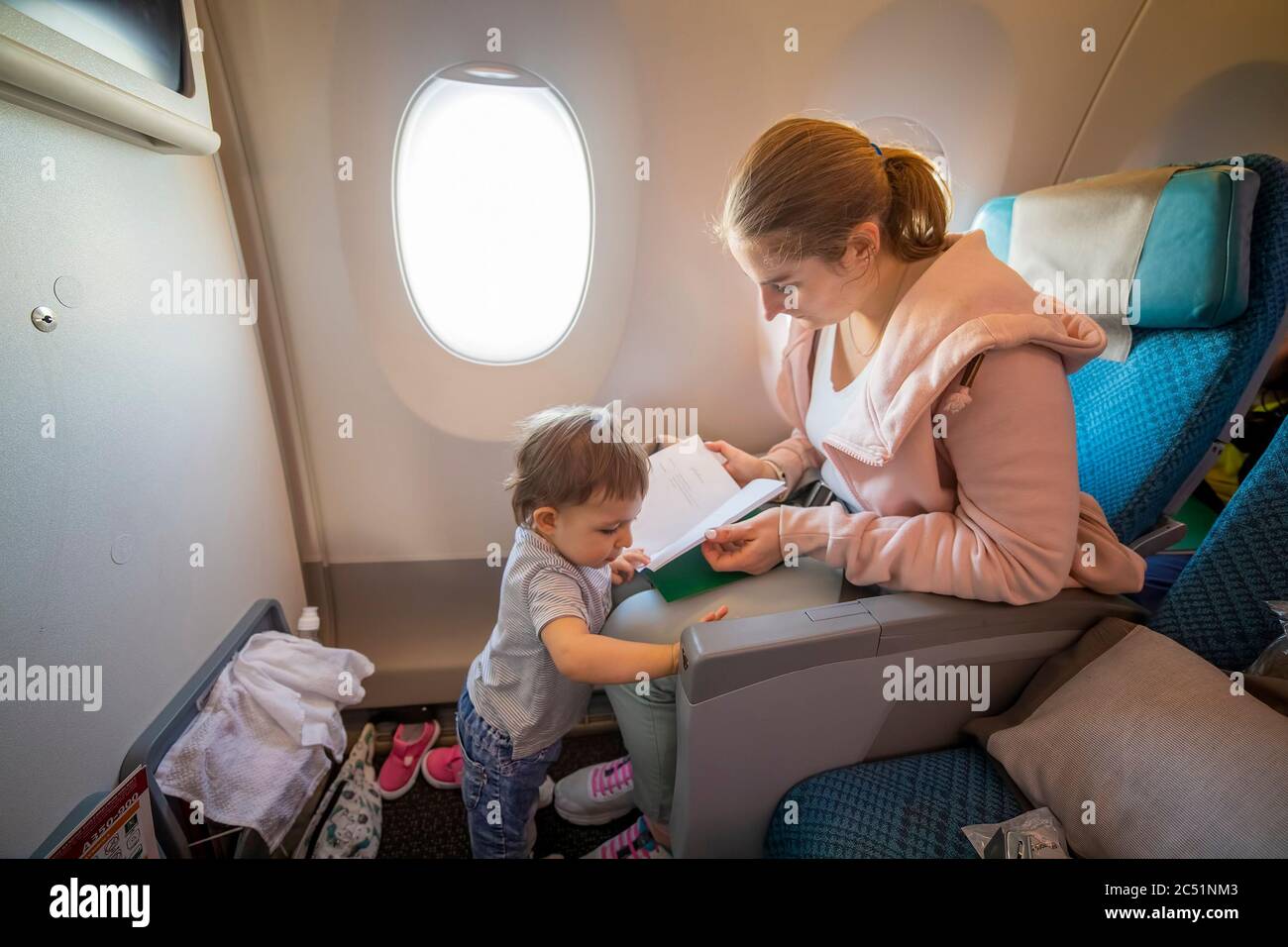 Mother daughter airport window hires stock photography and images Alamy