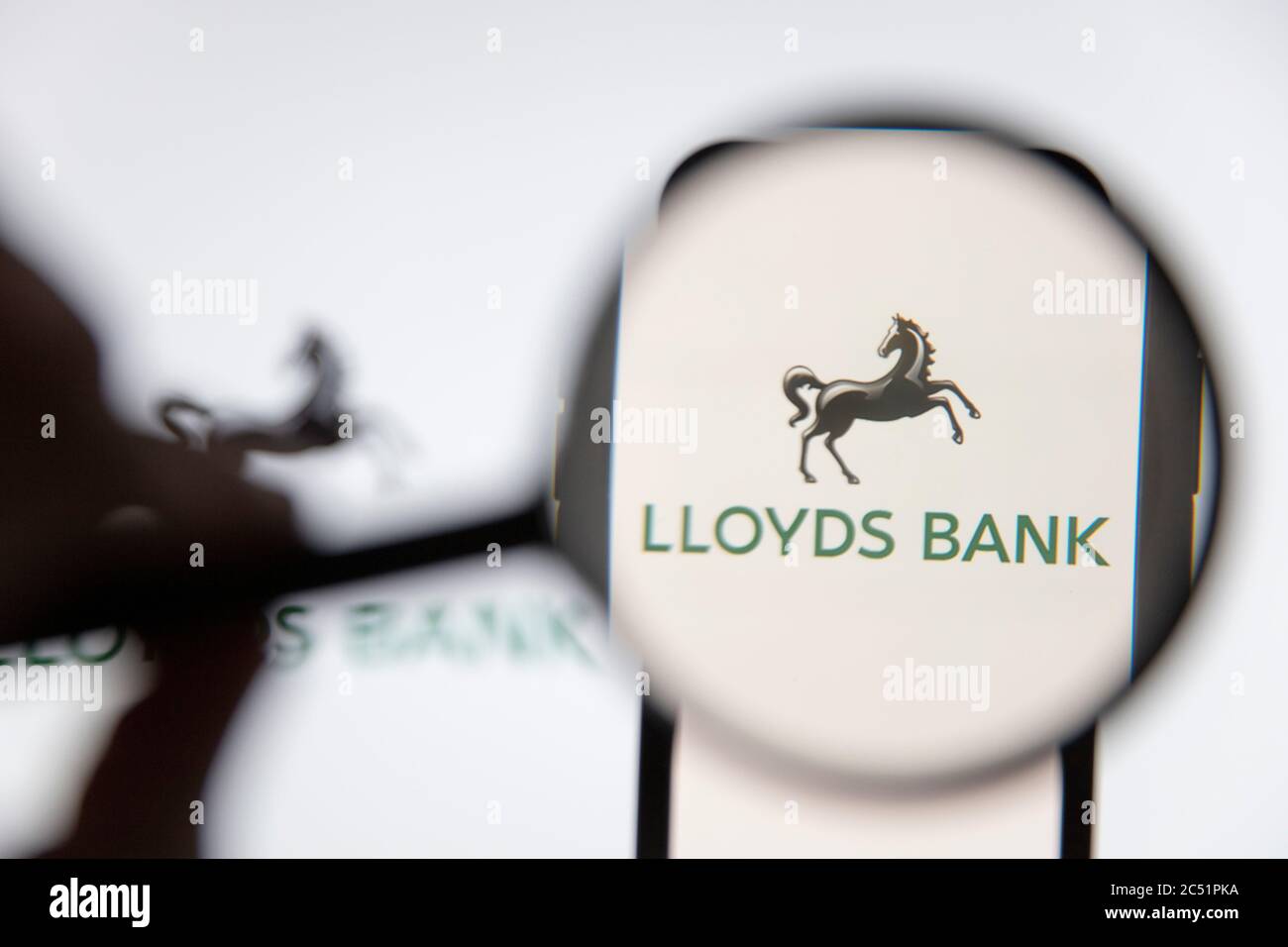 LONDON, UK - June 2020: Lloyds bank logounder a magnifying glass Stock Photo