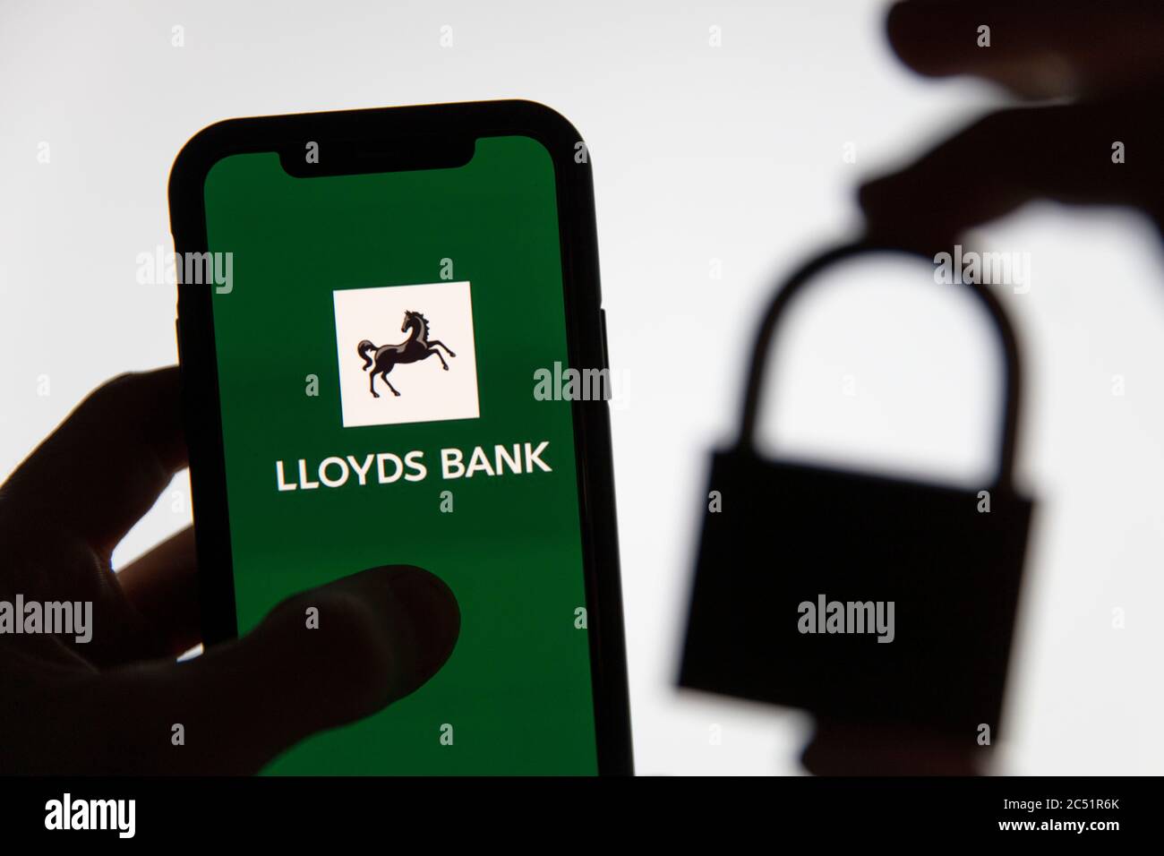 LONDON, UK - June 2020: Lloyds bank logo on a phone with a security padlock Stock Photo