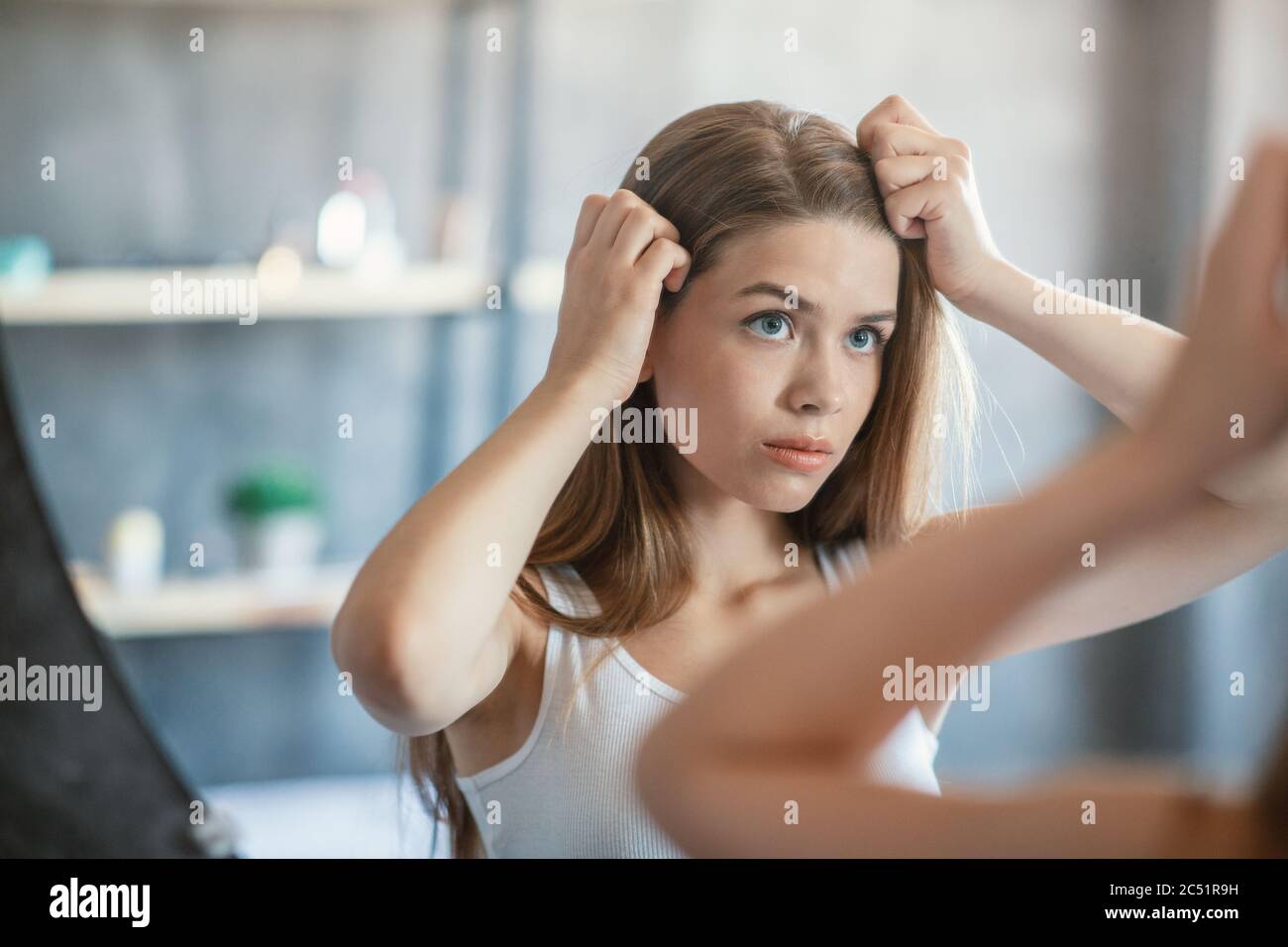 The young woman is looking sad on the pink background. Stock Photo by  ©vova130555@gmail.com 186125244