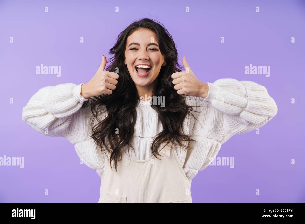 Image of positive smiling happy young brunette woman posing isolated ...