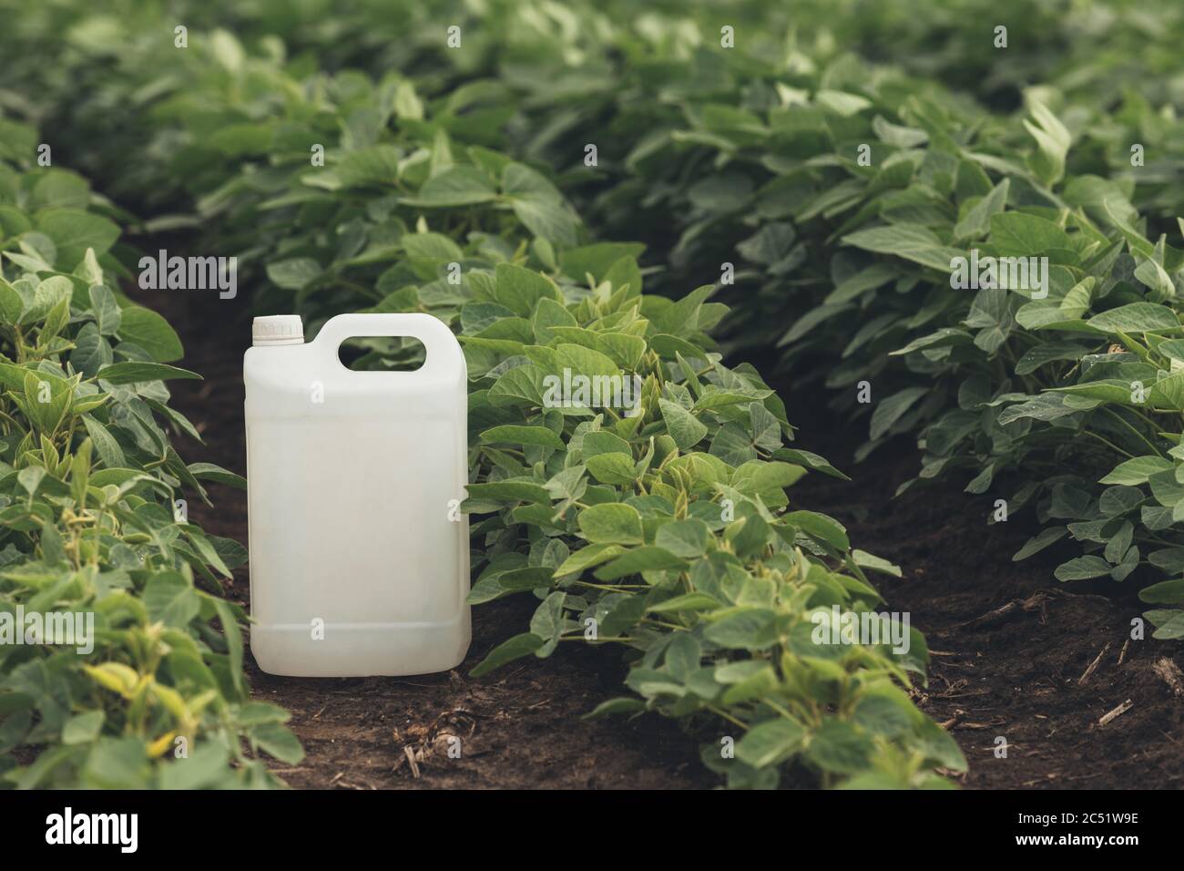 Soybean crop protection concept with blank generic pesticide canister