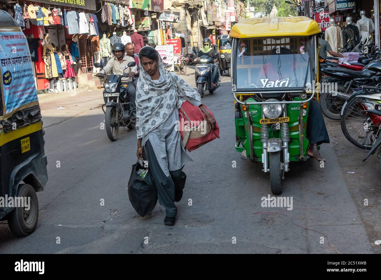 Indian woman walking hi-res stock photography and images - Alamy