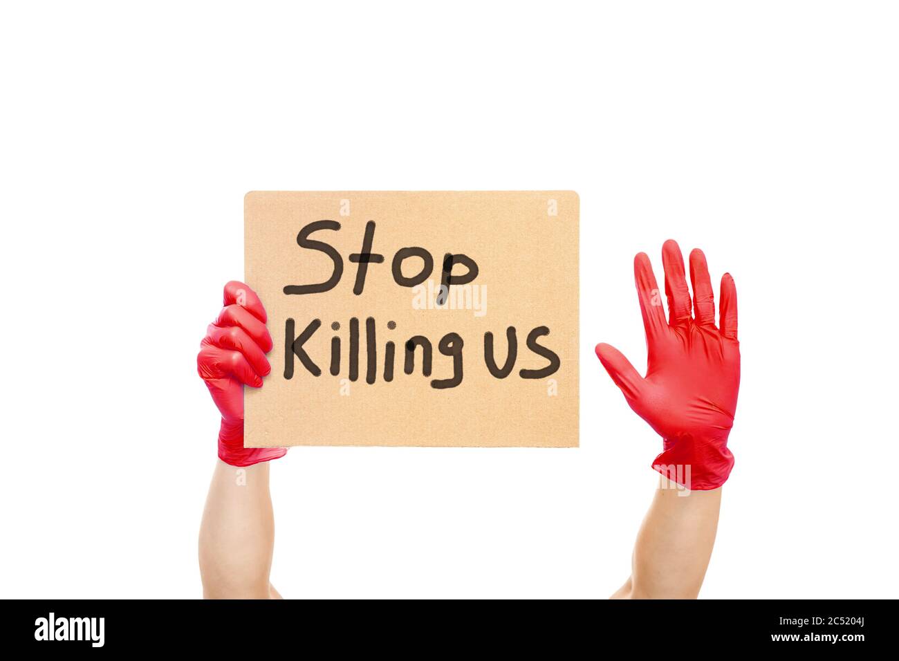 hands in red gloves are holding a cardboard with the slogan Stop Killing Us and showing palm stop gesture, mockup protest on theme of police brutality Stock Photo