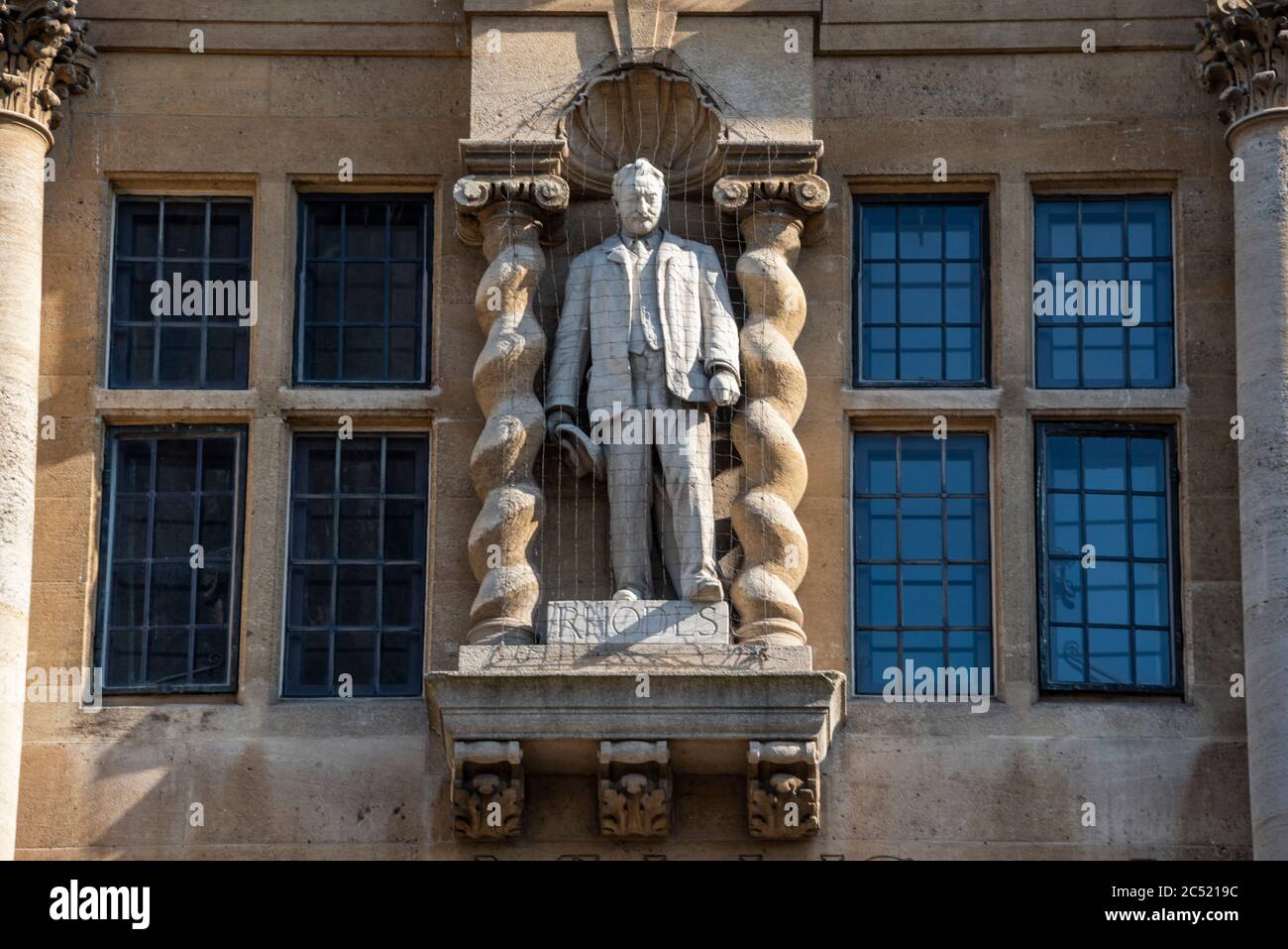 Statue of Cecil Rhodes on the frontage of Oriel College, High Street, Oxford. The statue was the focus of Rhodes Must Fall protests in 2016 and again in 2020 of the Rhodes Must Fall and Black Lives Matter protests. Stock Photo