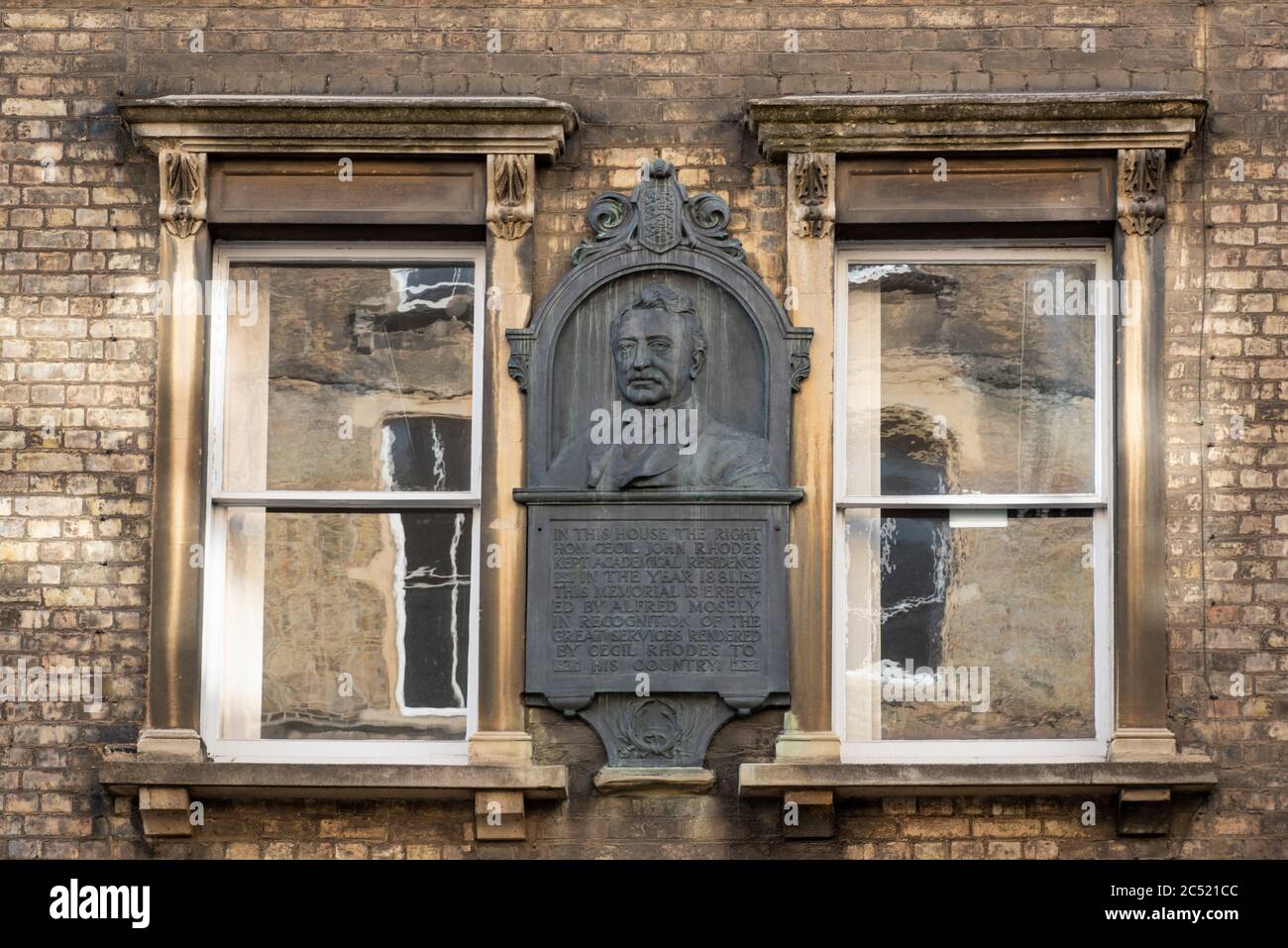 Plaque on the wall of 6 King Edward Street, Oxford, commemorating the time Cecil Rhodes lived there as a student in 1881. The plaque is round the corner from the statue of Rhodes which has been the focus of protests by the Black Lives Matter and Rhodes Must fall demonstrations of 2020, in protest at his profile as a colonialist. Stock Photo