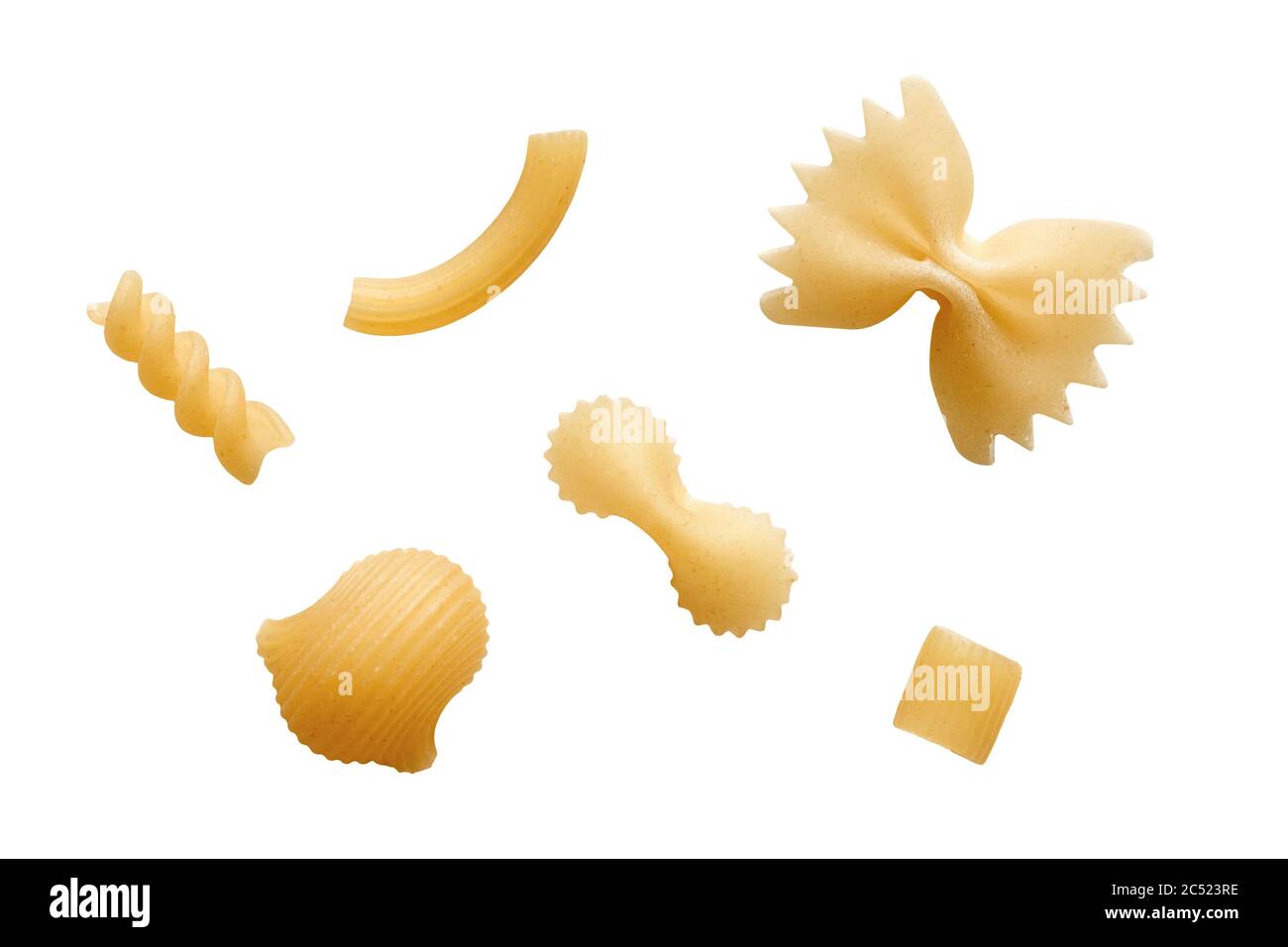 Various raw pasta isolated on white background. Farfalle, rotini, ziti ...