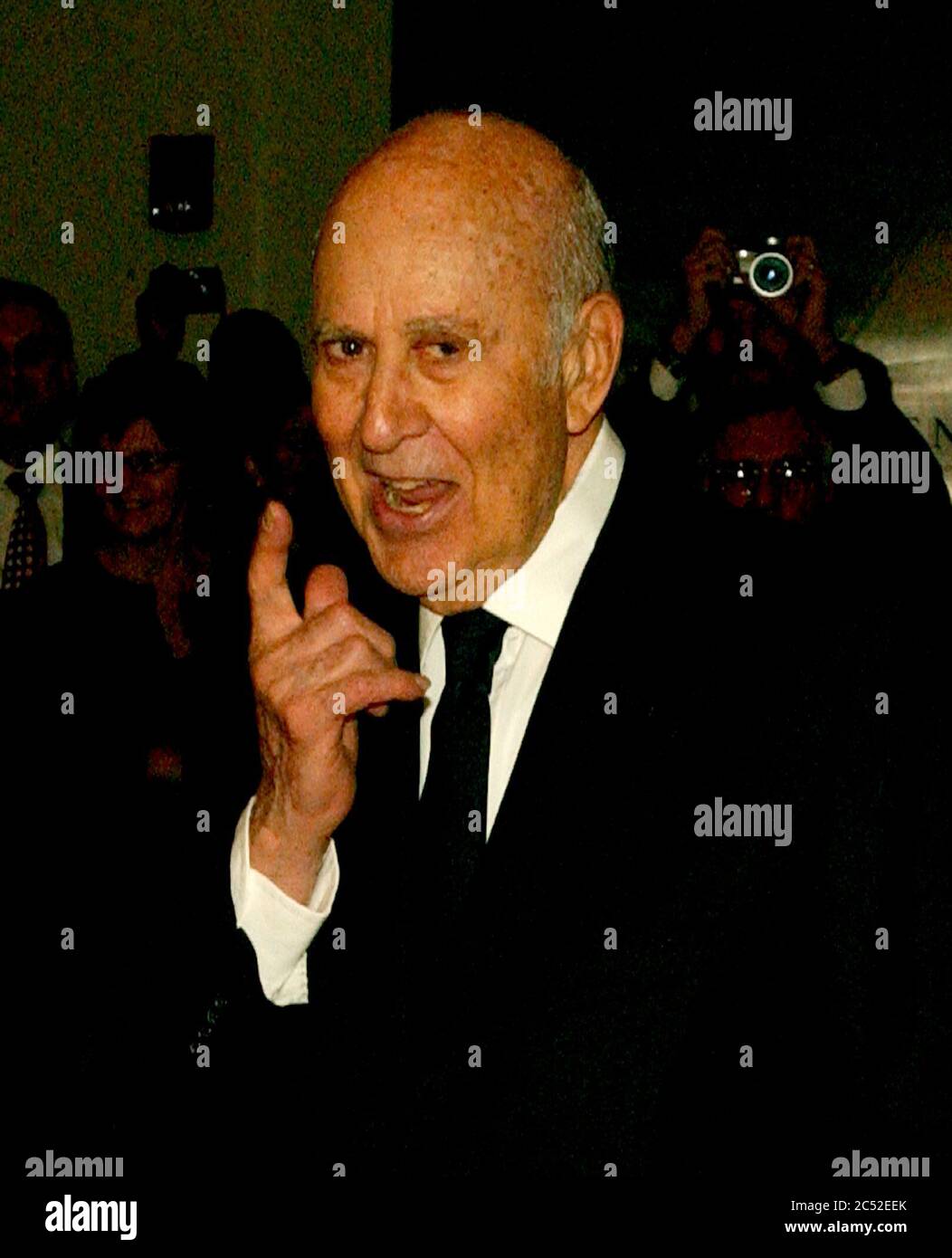 Carl Reiner responds to a reporter's question as he arrives for the eighth annual Mark Twain Prize for American Humor, which is being awarded this year to Steve Martin at the John F. Kennedy Center for the Performing Arts in Washington, DC on October 23, 2005.Credit: Ron Sachs/CNP | usage worldwide Stock Photo