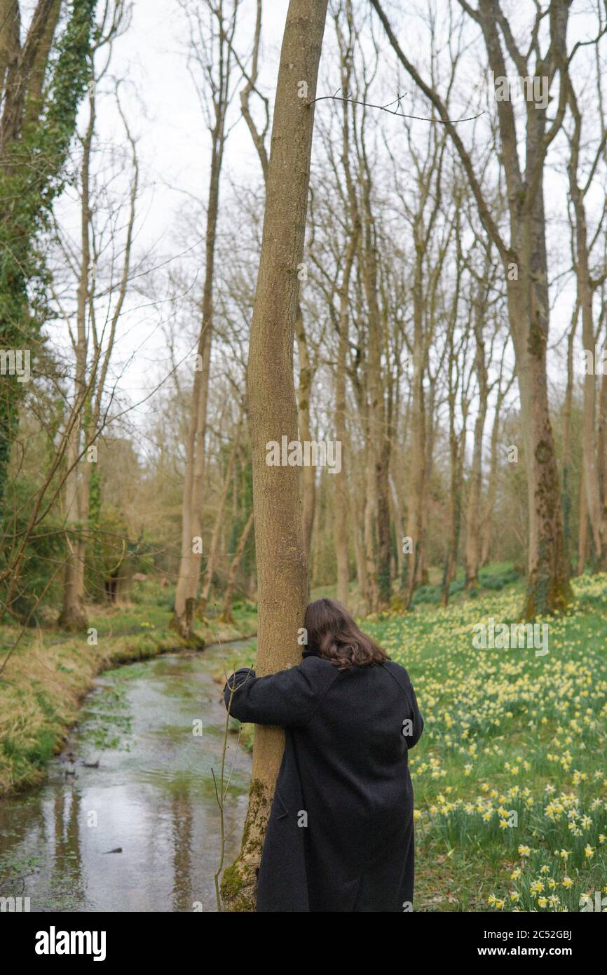 Rear view woman standing riverbank hi-res stock photography and images ...