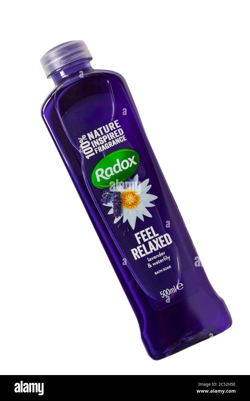 Bottle of Radox feel relaxed lavender & waterlily bath foam isolated on white background - 100% nature inspired fragrance Stock Photo