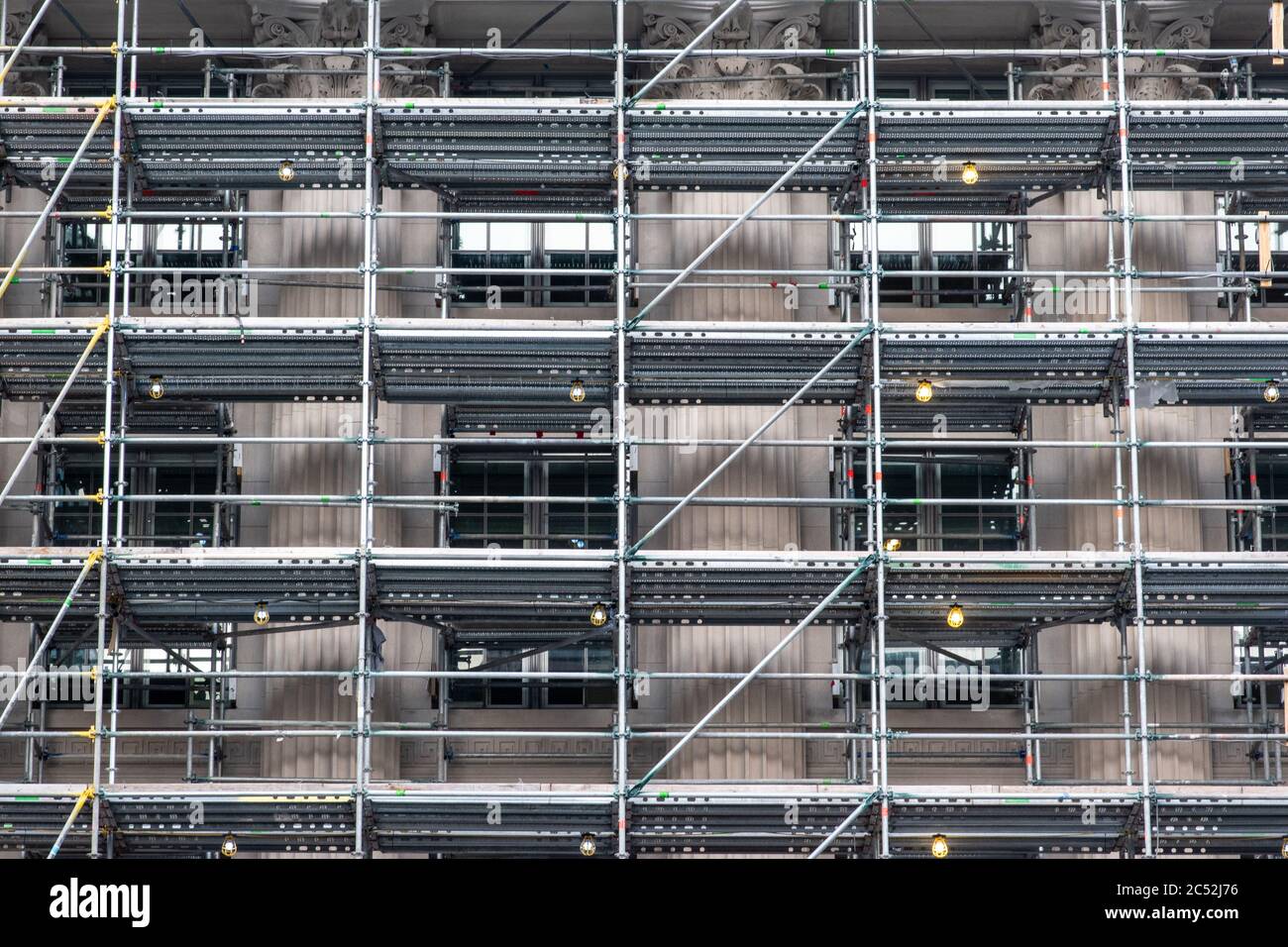 Government building under renovation with scaffolding. Stock Photo