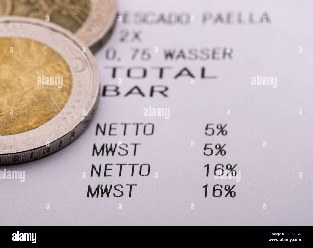 Dresden, Germany. 30th June, 2020. On a receipt of a restaurant bill printed out for testing purposes, the VAT rates of 5 percent and 16 percent can be read. From 01.07.2020 until the end of the year, only 16 instead of 19 percent VAT will be charged when shopping, the reduced rate will drop from 7 to 5 percent. With this, the Federal Government wants to boost consumption again after the Corona crisis. Credit: Robert Michael/dpa-Zentralbild/dpa/Alamy Live News Stock Photo