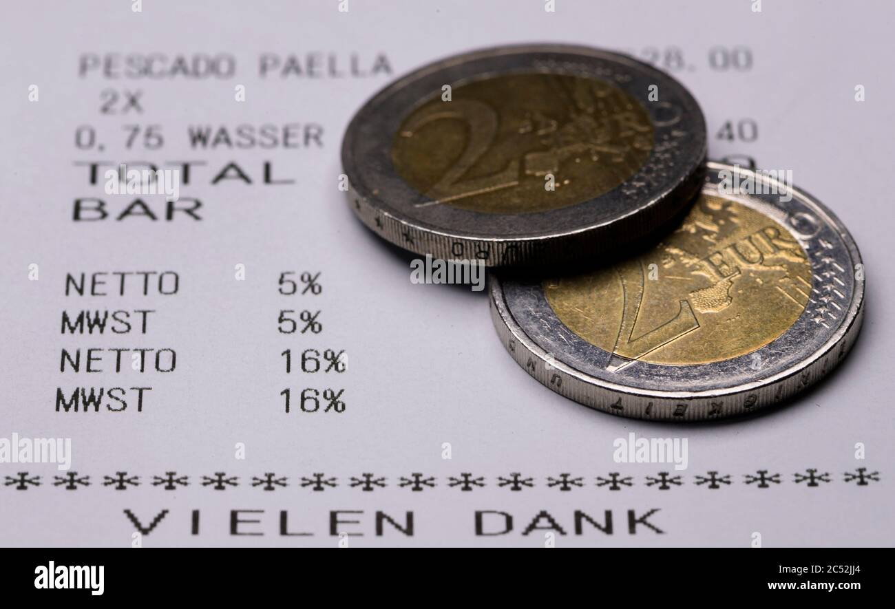 Dresden, Germany. 30th June, 2020. On a receipt of a restaurant bill printed out for testing purposes, the VAT rates of 5 percent and 16 percent can be read. From 01.07.2020 until the end of the year, only 16 instead of 19 percent VAT will be charged when shopping, the reduced rate will drop from 7 to 5 percent. With this, the Federal Government wants to boost consumption again after the Corona crisis. Credit: Robert Michael/dpa-Zentralbild/dpa/Alamy Live News Stock Photo