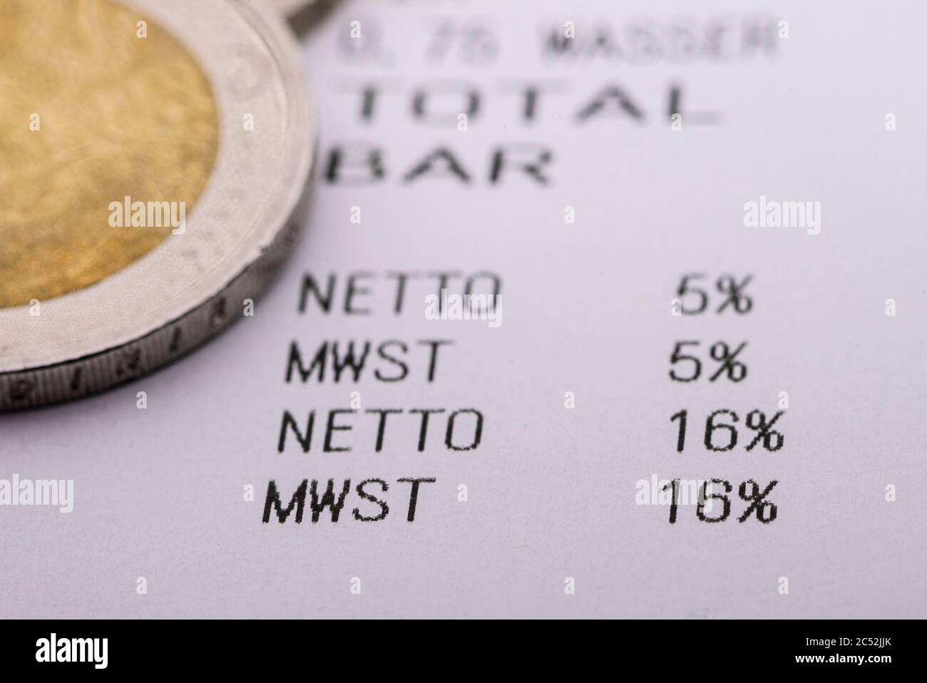 Dresden, Germany. 30th June, 2020. On a receipt of a restaurant bill printed out for testing purposes, the VAT rates of 5 percent and 16 percent can be read. From 01.07.2020 until the end of the year, only 16 instead of 19 percent VAT will be charged when shopping, the reduced rate will drop from 7 to 5 percent. With this, the Federal Government wants to boost consumption again after the Corona crisis. Credit: Robert Michael/dpa-Zentralbild/dpa/Alamy Live News Stock Photo