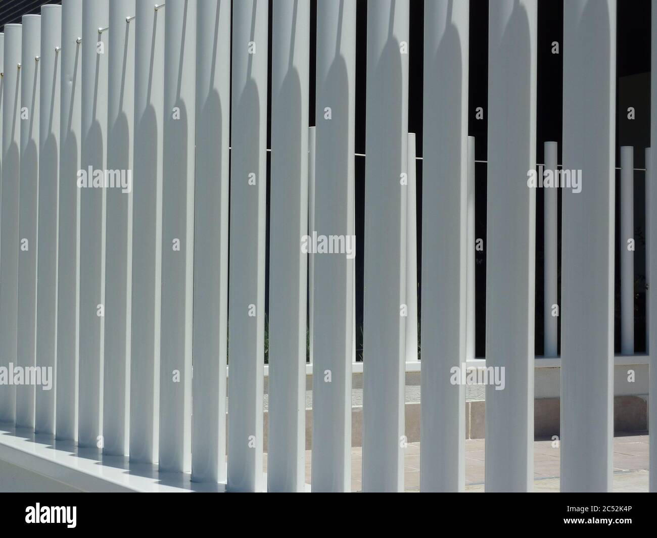 Closeup shot of a white painted metallic fence Stock Photo - Alamy