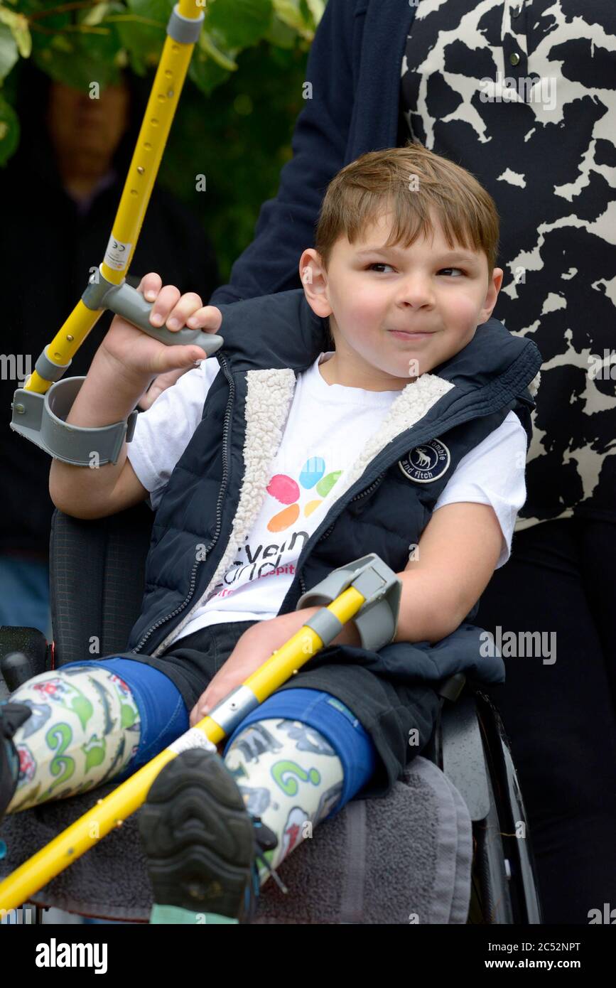 King's Hill, Kent, UK. 30th June, 2020. 5 year old Tony Hudgell finishes his last daily walk after covering more than 10km and raising more than £1,000,000 for the Evelina Hospital who saved his life and nursed him back to health after he had both legs amputated following abuse by his birth parents. Credit: PjrFoto/Alamy Live News Stock Photo
