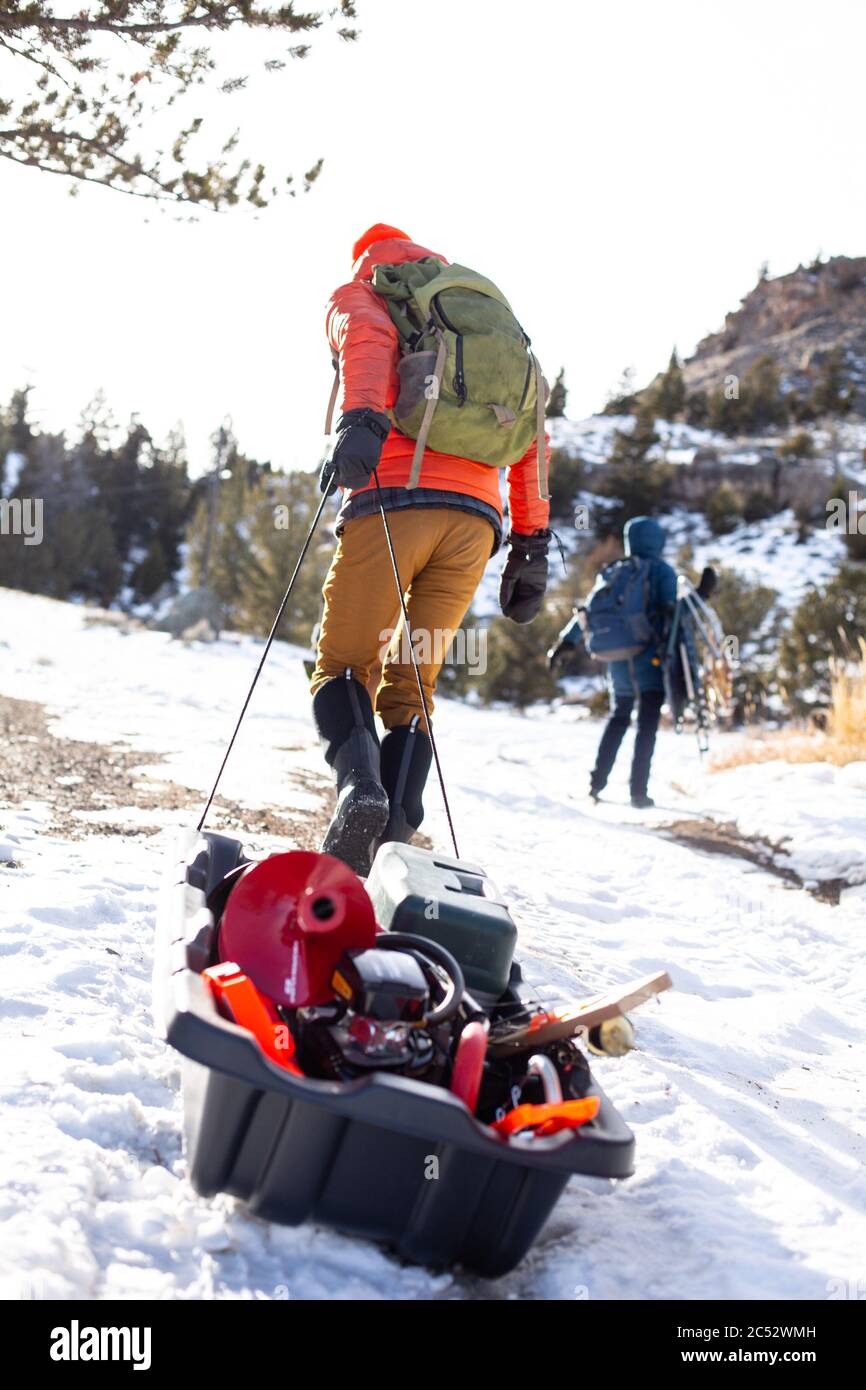Man pulling sled hires stock photography and images Alamy