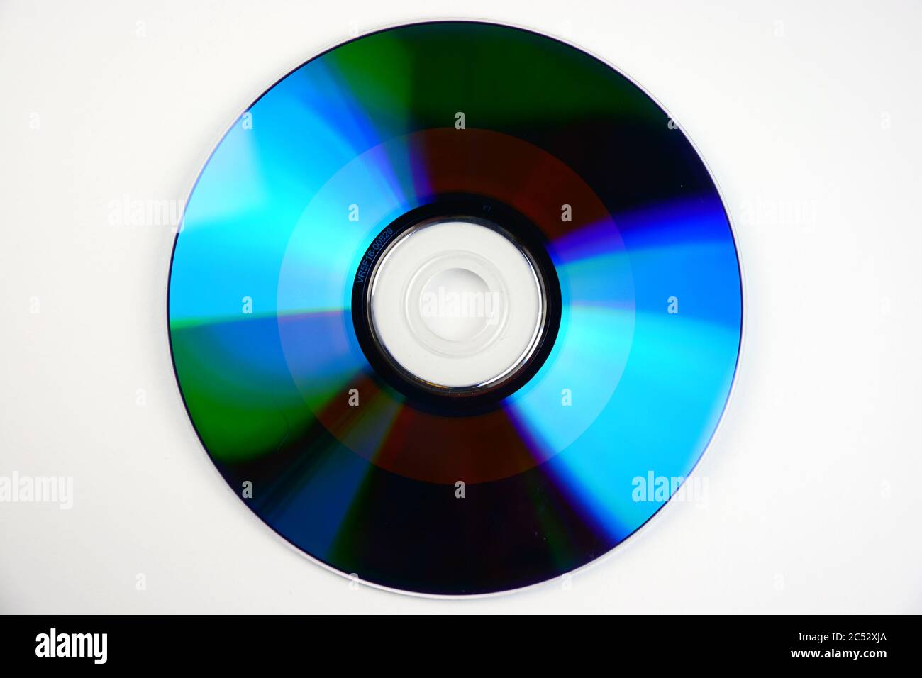 High angle shot of a disk on a white surface Stock Photo