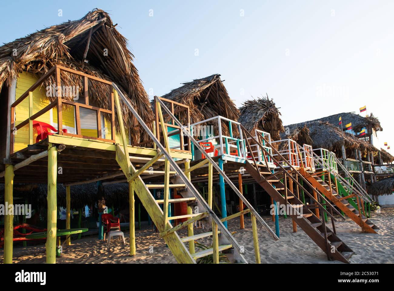 Small wooden bungalows along Playa Blanca beach, Cartagena, Colombia Stock Photo