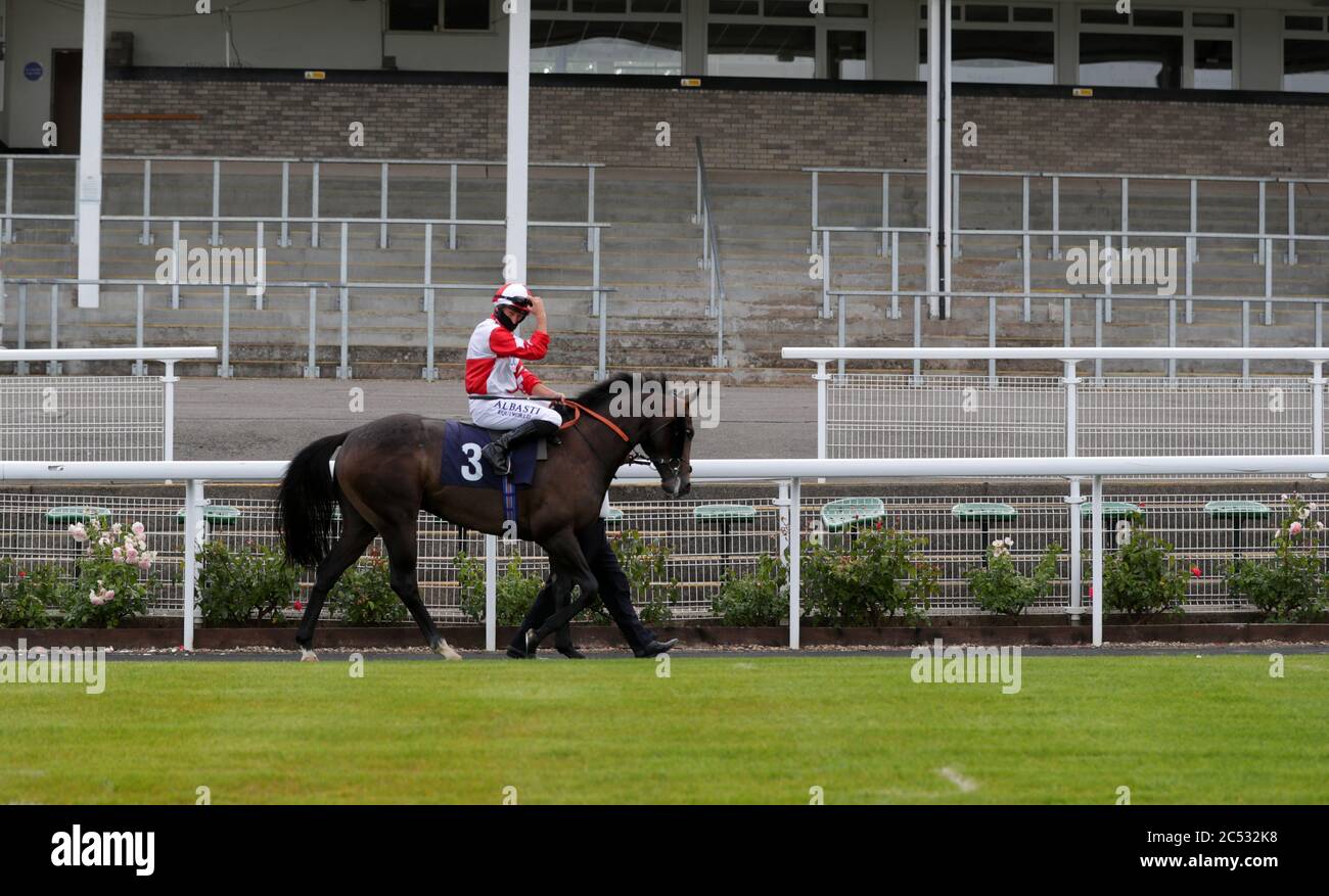 No Leci ridden by Tom Marquand goes to post before the Gent Transport And Warehousing Novice Auction Stakes at Chepstow Racecourse. Stock Photo