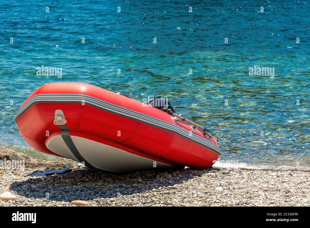 Red rescue inflatable boat, closeup. Empty marine rescue boat ...